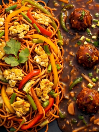 Egg Hakka Noodles With Veg Manchurain Gravy