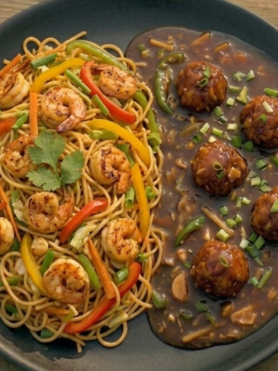 Veg Singapori Noodles With Veg Manchurain Gravy